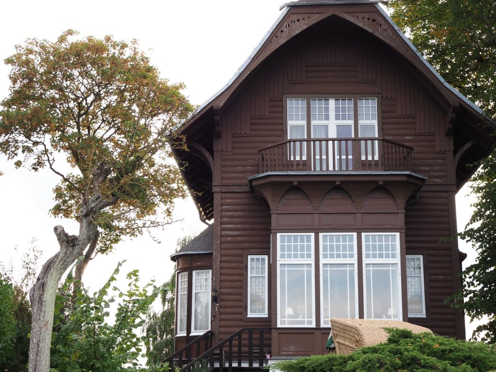 Beautiful rustic wooden house with intricate design in Germany, showcasing traditional architecture.